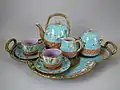 Tea set, 1873, naturalistic apple blossom pattern.