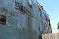 Historic tin siding on building. Pressed tin was used to fire proof many of the wooden buildings after the 1926 fire.
