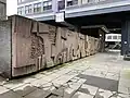 Concrete mural by Keith McCarter underneath the Elmbank Gardens hotel tower