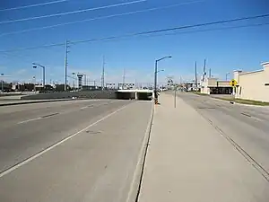Looking north at FM 1092 underpass at US 90 Alt. in Stafford